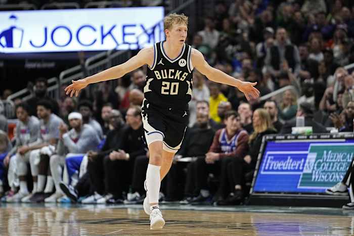 Milwaukee Bucks guard AJ Green (20) reacts after scoring a basket